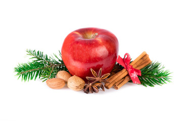 Red apple with christmas spices on white. Apple rustic still life.