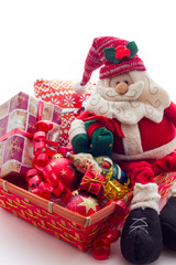 Fototapeta na wymiar Basket with Christmas gifts