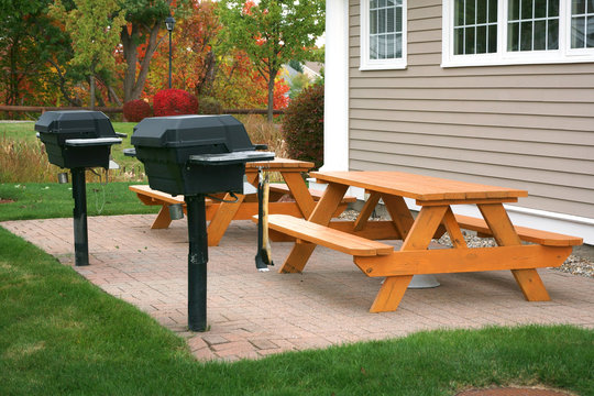 Barbecue Grill Area Outdoor With Wooden Table