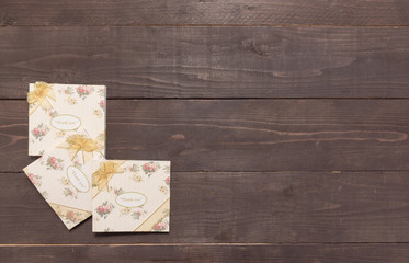 Notebooks with thank you message are on the wooden background