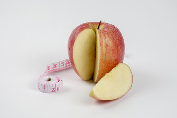 apple and stethoscope on white. Medical concept
