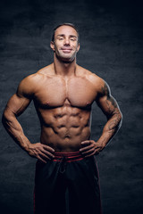 Fototapeta na wymiar Portrait of shirtless muscular middle age male.