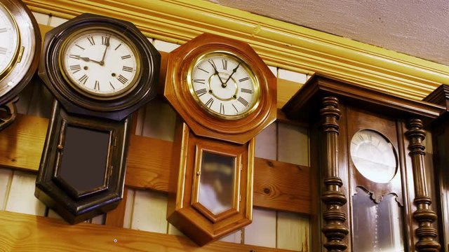 Clocks for repair hanging on the wall - Powered by Adobe