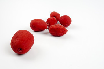 Red pickles isolated on white