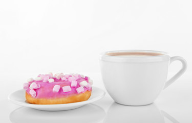 Delicious doughnut and cup of coffee isolated on white