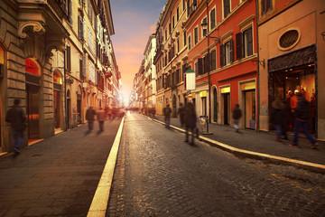 Fototapeta na wymiar people walking on wall street with european building style rome italy