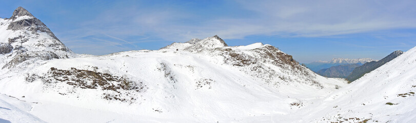 Landscape at Orobie Alps during spring season. Snow is melting. Valcanale area. Path from Alpe Corte lodge to Branchino natural lake. Arera Group of mountain