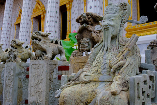Detail of Stone statue for Thai-Chinese style  and thai art architecture in Wat Arun buddhist temple in Bangkok, Thailand.Photo taken on: 21 November , 2016