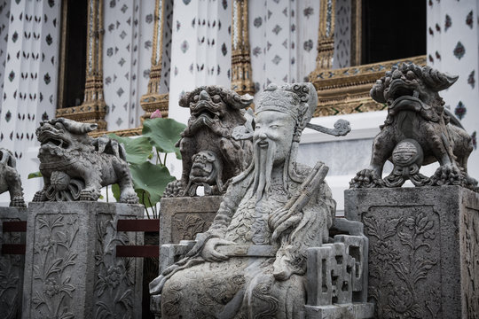 Detail of Stone statue for Thai-Chinese style  and thai art architecture in Wat Arun buddhist temple in Bangkok, Thailand.Photo taken on: 21 November , 2016