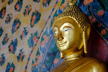 Face of Buddha gold and thai art architecture in Wat Arun buddhist temple in Bangkok, Thailand.Photo taken on: 21 November , 2016