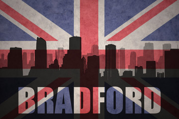 abstract silhouette of the city with text Bradford at the vintage british flag