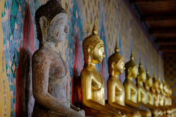 Row of Buddha gold  and thai art architecture in Wat Arun buddhist temple in Bangkok, Thailand.Photo taken on: 21 November , 2016
