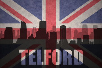 abstract silhouette of the city with text Telford at the vintage british flag