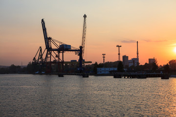 Fototapeta na wymiar Industrial view of port at sunset, Gdansk, Poland