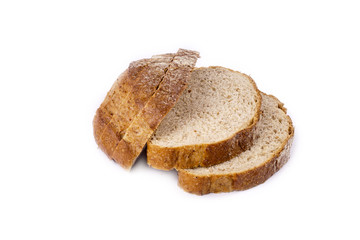 Fresh whole grain bread cut in half on white background