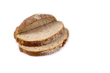 Fresh whole grain bread cut in half on white background