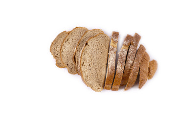Fresh whole grain bread cut in half on white background