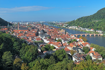 Fototapeta premium View of Heidelberg Old Town with Jesuit Church, Church of the Holy Spirit and Old Bridge over the Neckar River, Germany 