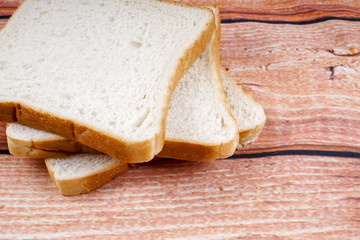 Slice of bread with chocolate hazelnut spread isolated on white