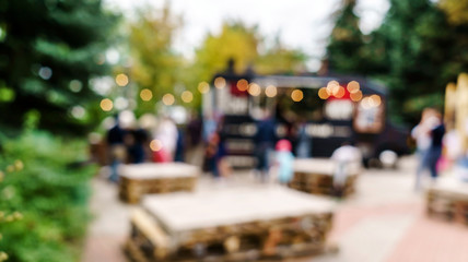 blur people picnic in a public Park