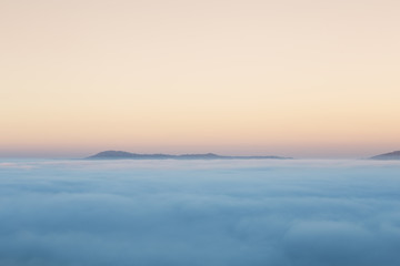 Fototapeta na wymiar fog in the morning with mountain at Khao Kho, Thailand