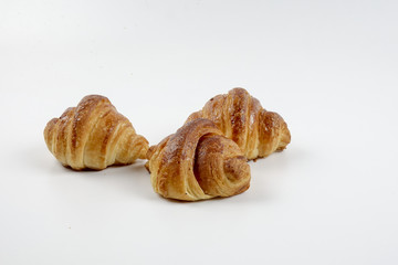 Fresh whole grain bread cut in half on white background