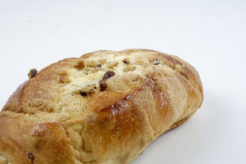 sweet bread with raisin isolated on whie
