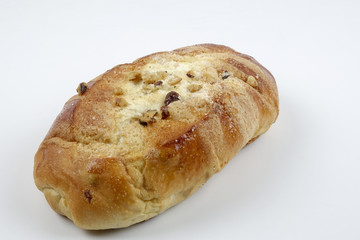 sweet bread with raisin isolated on whie