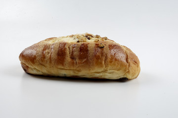 sweet bread with raisin isolated on whie