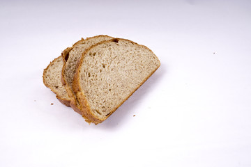 Whole grain bread isolated on white.