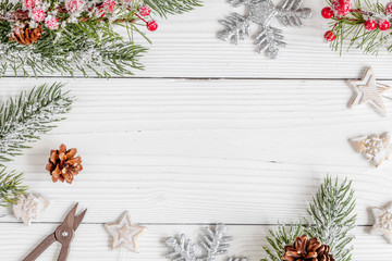 packaging christmas gifts on wooden background top view