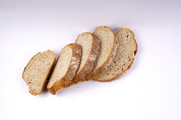 Whole grain bread isolated on white.
