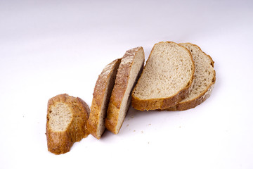 Whole grain bread isolated on white.