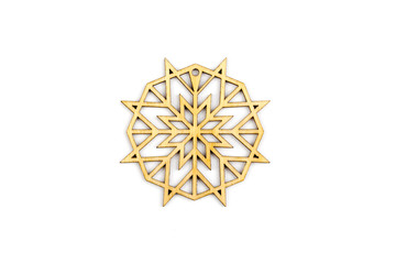 Winter,Christmas, New Year wooden decoration - snowflake, star. Isolated on white background. Top view. Closeup.