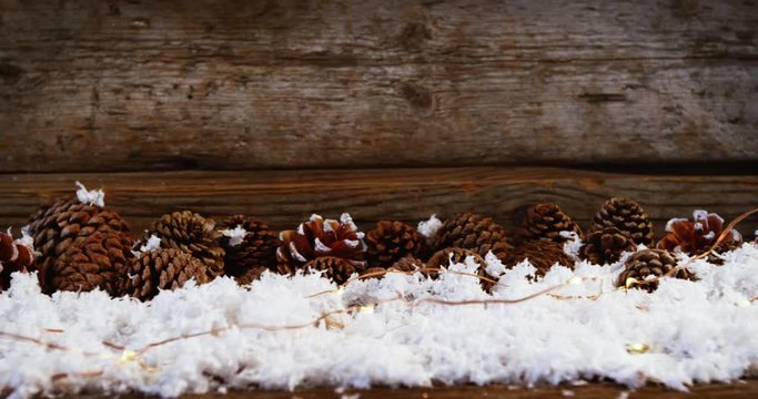 Pine cones decoration on fake snow