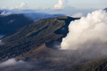 Wide angle view of Mount Bromo in Tengger Semeru National Park, East Java, Indonesia during beutiful sunrise with the valley full of sea cloud.