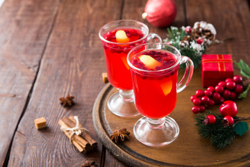Christmas card. hot spicy Christmas drink of cranberry and spice