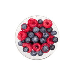 Glass of berries isolated on white background top view flat lay