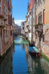 Naklejka na ściany i meble scenic canal with colorful ancient houses, Venice, Italy
