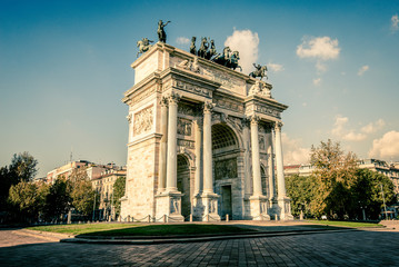 view of Arch of Peace Sempione Park Milan city at dusk 