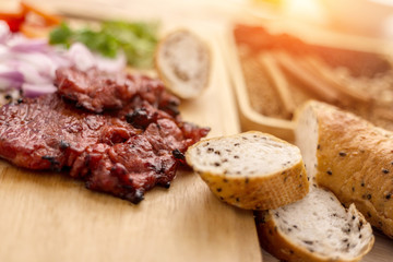 Obraz na płótnie Canvas Grilled pork chops in sweet honey glaze, served in grill iron sk