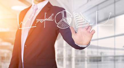 Businessman touching technology interface with business and fina