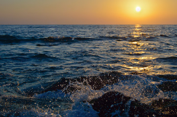 sea ​​spray at sunset