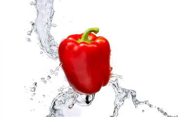 Water splash and vegetables isolated on white backgroud with clipping path. Fresh bell pepper