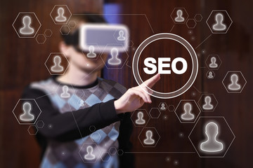 Businessman touch button seo in virtual reality device VR