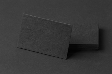Photo of black business cards. Template for branding identity.
