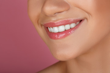 Beautiful smile with whitening teeth. Dental photo. Macro closeup of perfect female mouth,...