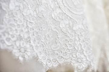 Obraz premium closeup white wedding dress fabric