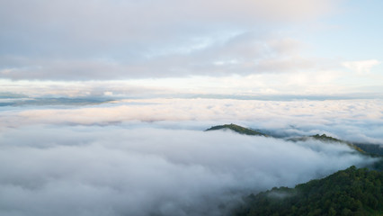 Landscape of moving mist in the mountain and hill. View point of mountain at Doi-Montngo, Chiang Mai –Thailand
