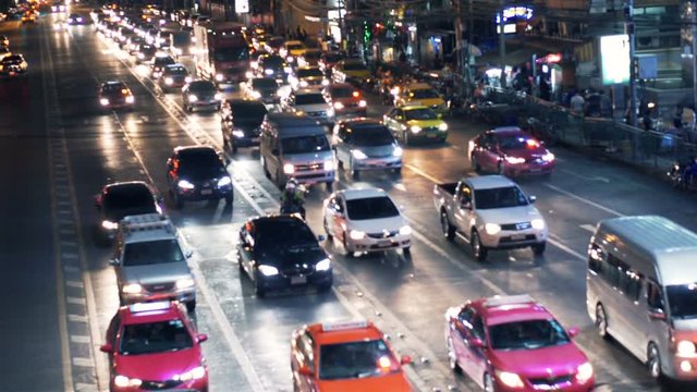 Street traffic in Bangkok at night
